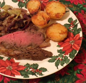 Grassfed Holiday Feast Grass fed meat, roast potatoes, and cabbage for a Christmas holiday feast.